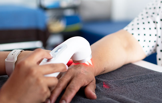 Patient undergoing Light Therapy at Harbor Health Center