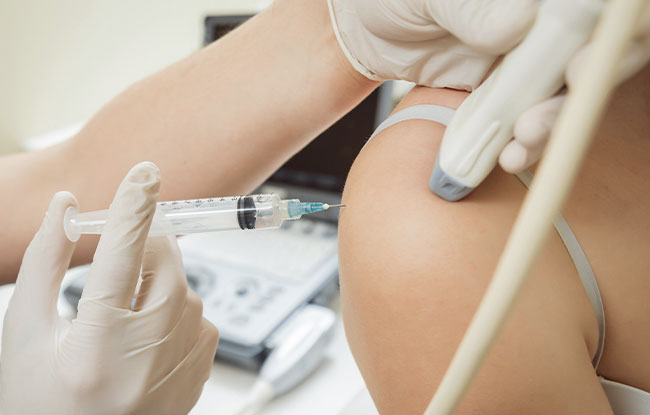 Patient undergoing Ultrasound-Guided Nerve Hydrodissection at Harbor Health Center